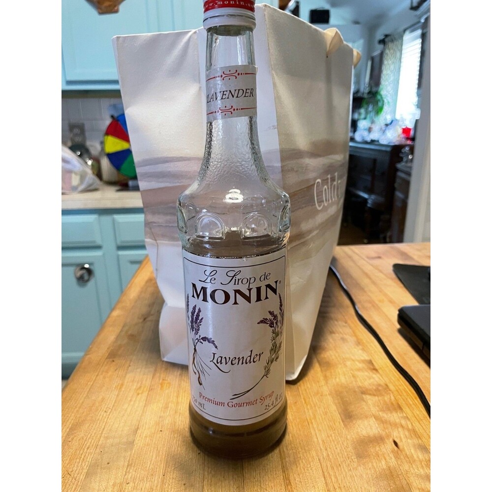 Monin lavender flavoring syrup 2/3 full